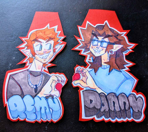 Couple style badges made with markers and colored pencils
